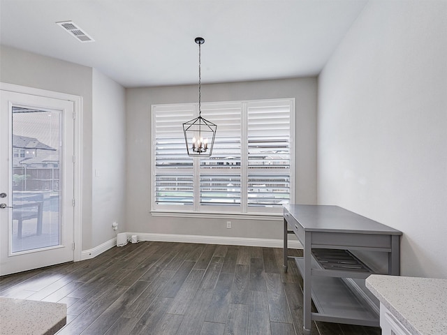 2815 Spring Creek Trl, Celina, TX 75078 - dining space with dark wood-style floors, a chandelier, and baseboards