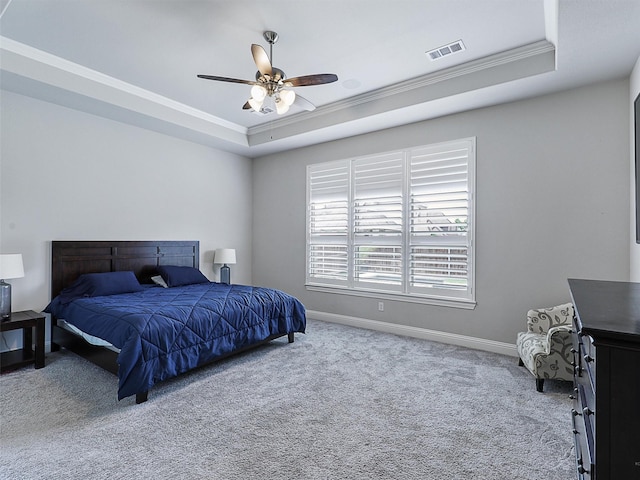 2815 Spring Creek Trl, Celina, TX 75078 - bedroom with a tray ceiling, ornamental molding, carpet floors, baseboards, and a ceiling fan