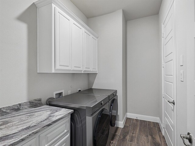2815 Spring Creek Trl, Celina, TX 75078 - washroom featuring cabinet space, wood tiled floors, baseboards, and separate washer and dryer