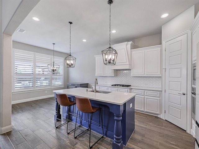 2815 Spring Creek Trl, Celina, TX 75078 - kitchen featuring a sink, a chandelier, a kitchen island with sink, black gas stovetop, and recessed lighting
