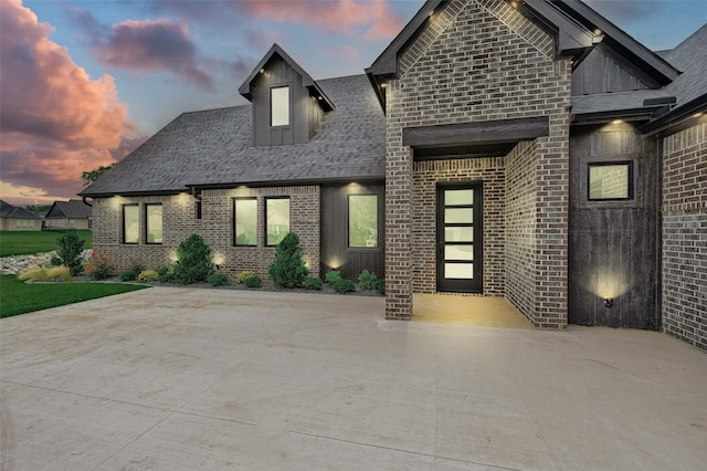 58 Lone Oak Blvd, Pottsboro, TX 75076 - french provincial home featuring brick siding, a patio, and a shingled roof