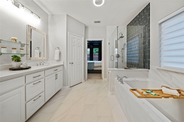 7812 Rockledge Dr, Mckinney, TX 75071 - ensuite bathroom with vanity, a garden tub, a tile shower, and marble finish floors