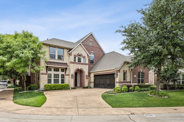 18261 Brighton Grn, Dallas, TX 75252 - french country home with a garage, concrete driveway, a front lawn, and brick siding