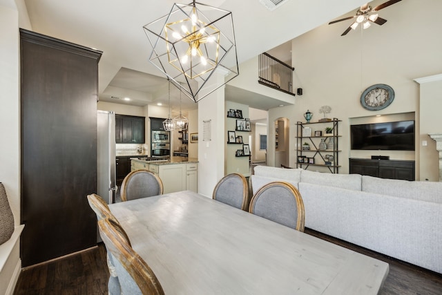 18261 Brighton Grn, Dallas, TX 75252 - dining room with dark wood-style flooring, a ceiling fan, and a chandelier