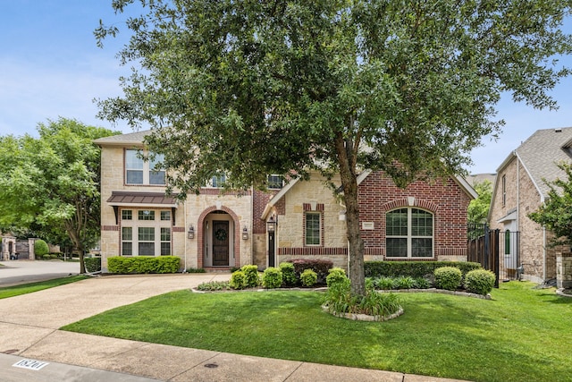 18261 Brighton Grn, Dallas, TX 75252 - view of front of house featuring stone siding, brick siding, and a standing seam roof