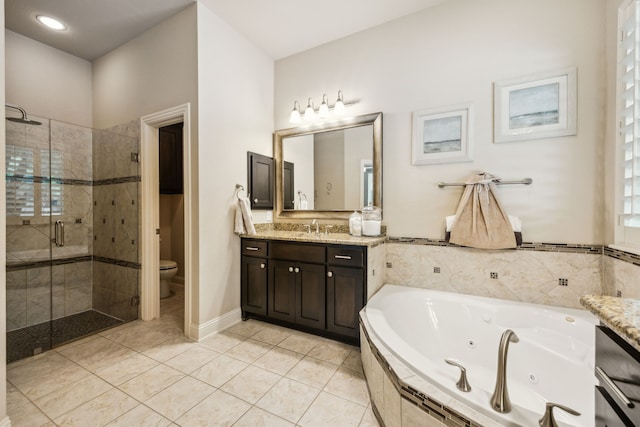 18261 Brighton Grn, Dallas, TX 75252 - bathroom featuring a shower stall, a whirlpool tub, vanity, toilet, and tile patterned flooring