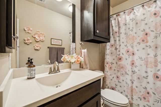 18261 Brighton Grn, Dallas, TX 75252 - bathroom featuring toilet, vanity, and a shower with shower curtain