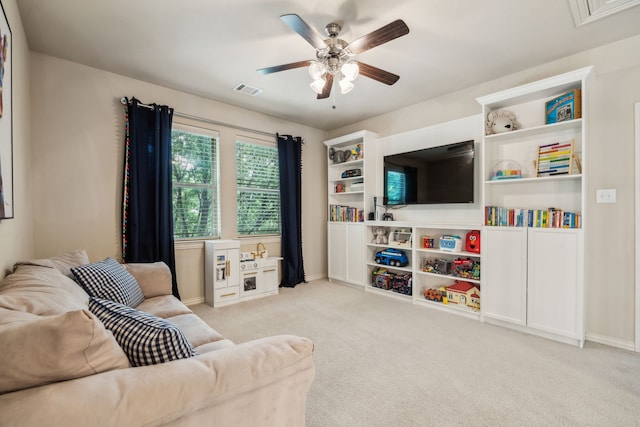 18261 Brighton Grn, Dallas, TX 75252 - living area featuring carpet, a ceiling fan, and baseboards