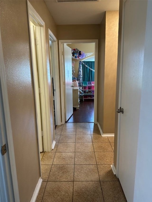 440 Maggie Cir, Flint, TX 75762 - corridor featuring light tile patterned floors and baseboards