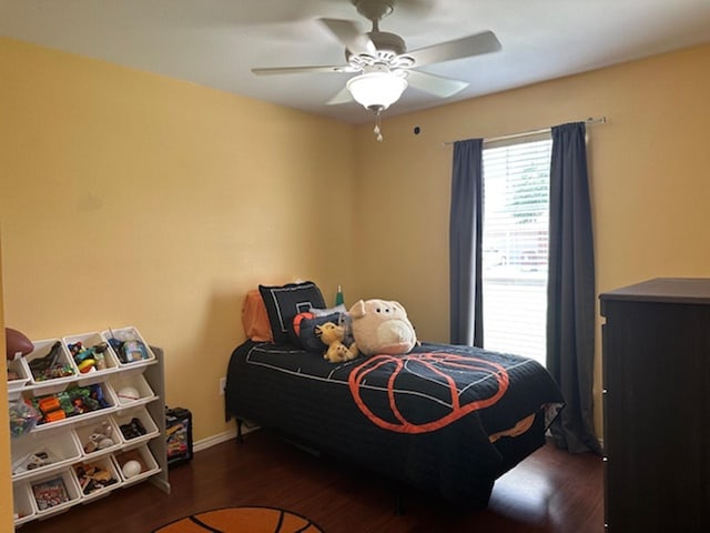 440 Maggie Cir, Flint, TX 75762 - bedroom featuring wood finished floors, ceiling fan, and baseboards