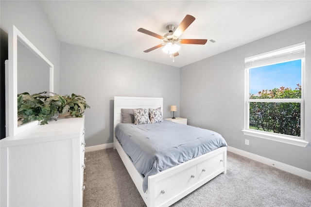 7524 Wispy Willow Ln, Little Elm, TX 76227 - bedroom with light colored carpet, baseboards, and a ceiling fan