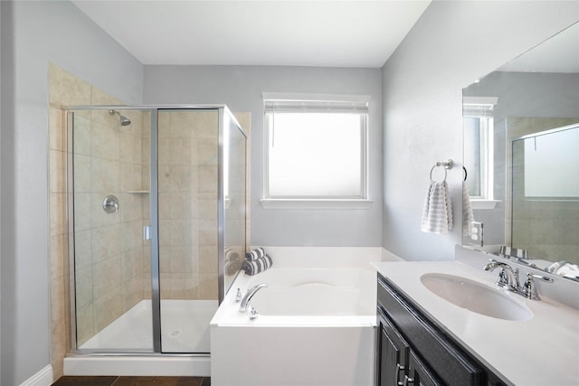 7524 Wispy Willow Ln, Little Elm, TX 76227 - full bathroom featuring a garden tub, vanity, and a shower stall