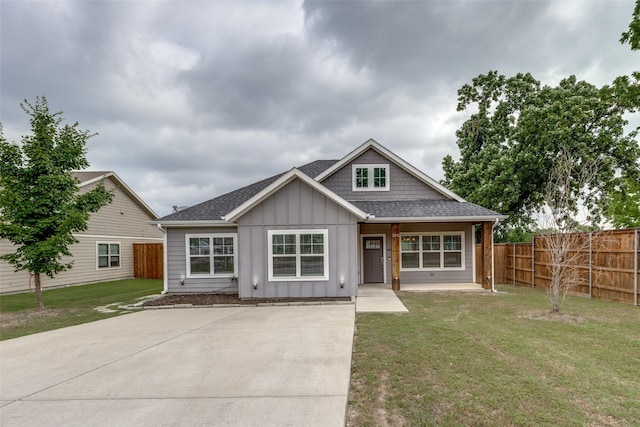 205 W Travis St, Howe, TX 75459 - view of front of house featuring board and batten siding, a shingled roof, and a porch