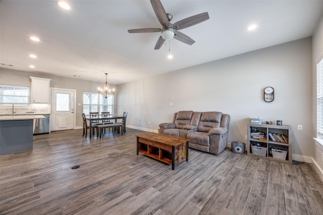 205 W Travis St, Howe, TX 75459 - living room with dark wood-type flooring, a chandelier, recessed lighting, a ceiling fan, and baseboards