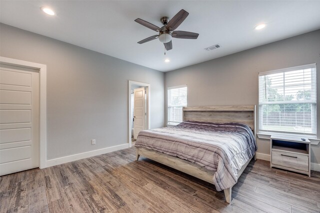 205 W Travis St, Howe, TX 75459 - bedroom featuring wood finished floors, baseboards, recessed lighting, and a ceiling fan