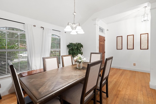 1042 Grimes Dr, Forney, TX 75126 - dining room with a chandelier, lofted ceiling, light wood-type flooring, and baseboards