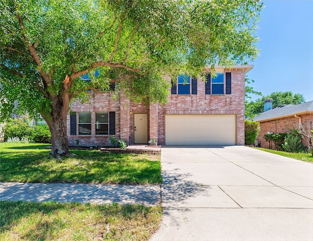 2036 Shawnee Trl, Fort Worth, TX 76247 - view of property hidden behind natural elements with a garage, driveway, a front lawn, and brick siding