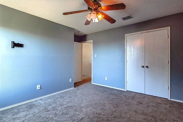 2036 Shawnee Trl, Fort Worth, TX 76247 - unfurnished bedroom with carpet floors, baseboards, a closet, and a ceiling fan