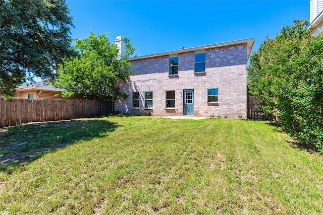 2036 Shawnee Trl, Fort Worth, TX 76247 - rear view of house featuring brick siding and a chimney