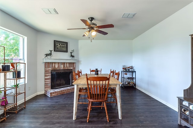 2036 Shawnee Trl, Fort Worth, TX 76247 - dining space featuring a ceiling fan, baseboards, a brick fireplace, and dark wood finished floors