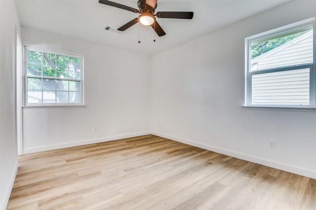 626 Thrush Ave, Duncanville, TX 75116 - empty room with light wood-style flooring, baseboards, and ceiling fan