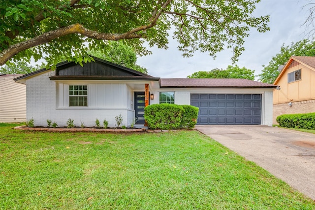 626 Thrush Ave, Duncanville, TX 75116 - view of front of property with brick siding, an attached garage, concrete driveway, and a front lawn