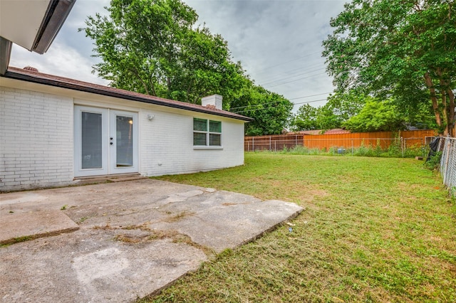 626 Thrush Ave, Duncanville, TX 75116 - view of yard featuring french doors and a patio area