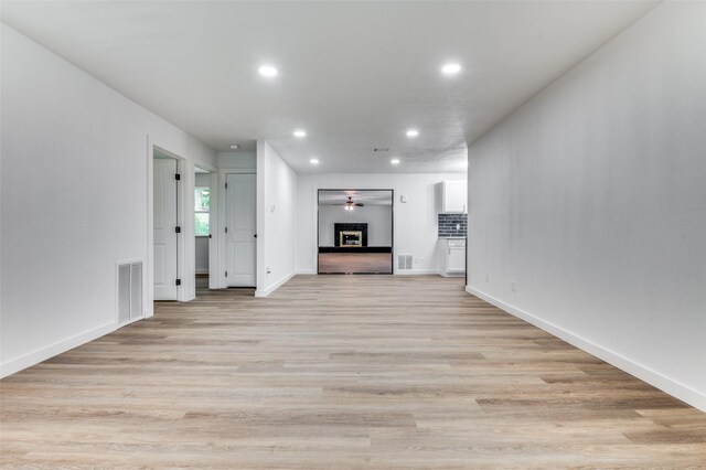 626 Thrush Ave, Duncanville, TX 75116 - unfurnished living room featuring recessed lighting, light wood finished floors, and baseboards