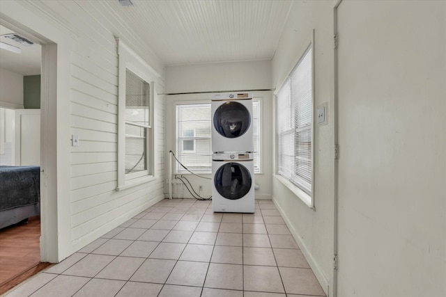 1710 Mckenzie Ave, Waco, TX 76708 - laundry area with estacked washer and dryer and light tile patterned floors