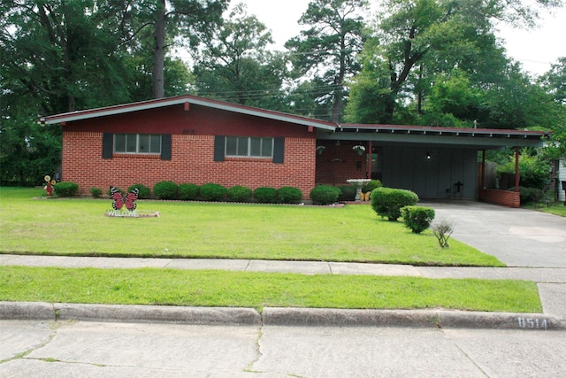 8514 Elmview Pl, Shreveport, LA 71108 - single story home with concrete driveway, a front lawn, and brick siding