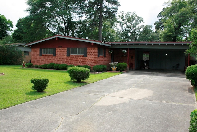 8514 Elmview Pl, Shreveport, LA 71108 - ranch-style house with brick siding, driveway, a front lawn, and an attached carport
