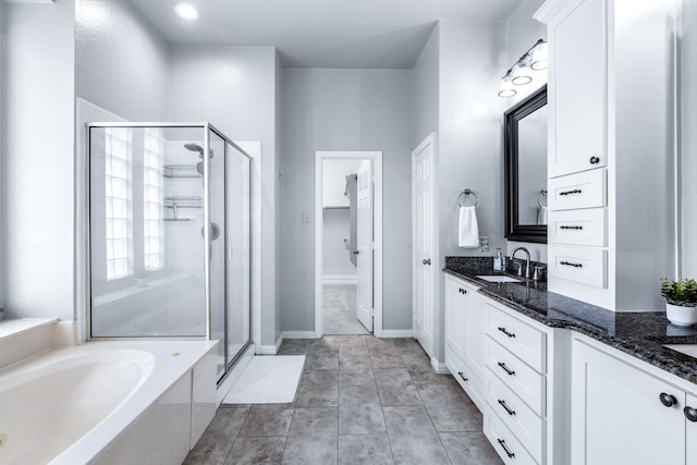 5820 Lakeland Ct, Sachse, TX 75048 - bathroom with a shower stall, vanity, and a bath