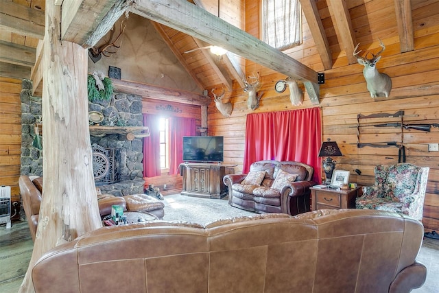 living area featuring wooden walls, wooden ceiling, and a fireplace