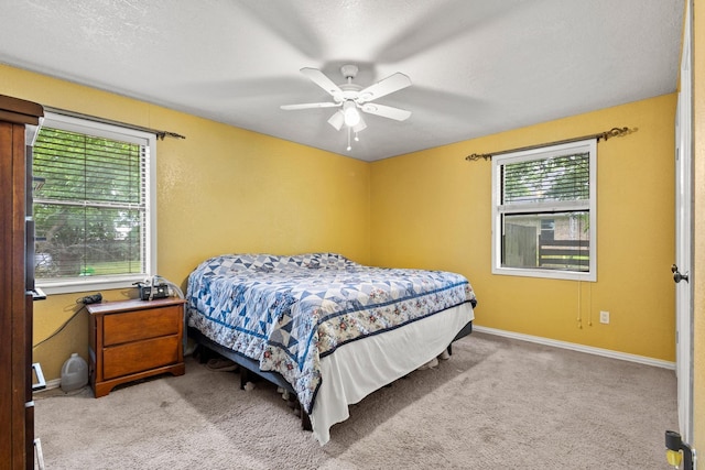 201 S Caney St, Dodd City, TX 75438 - bedroom with carpet flooring, baseboards, and ceiling fan