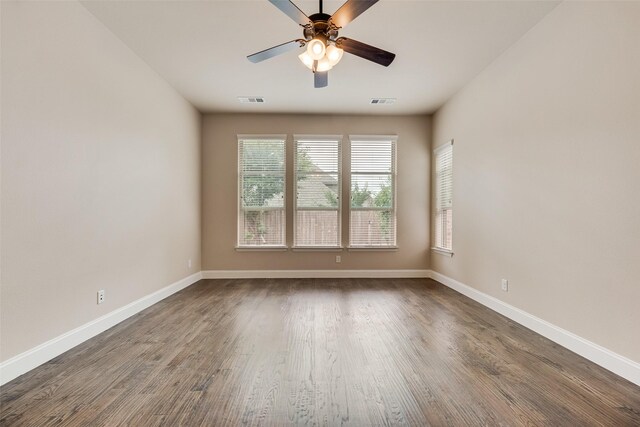 6809 Gallatin St, Mckinney, TX 75070 - unfurnished room featuring baseboards, a ceiling fan, and dark wood-type flooring