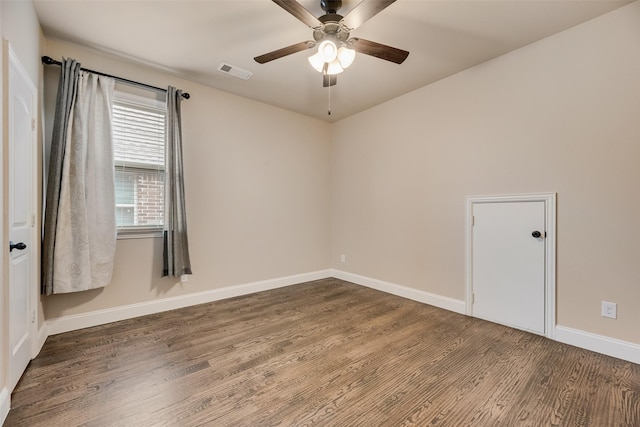 6809 Gallatin St, Mckinney, TX 75070 - spare room with wood finished floors, a ceiling fan, and baseboards