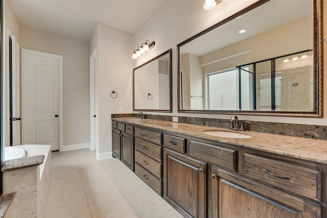 6809 Gallatin St, Mckinney, TX 75070 - full bath with double vanity, tiled shower, baseboards, and tile patterned flooring