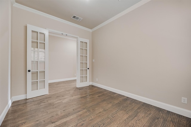 6809 Gallatin St, Mckinney, TX 75070 - empty room with french doors, crown molding, wood finished floors, and baseboards