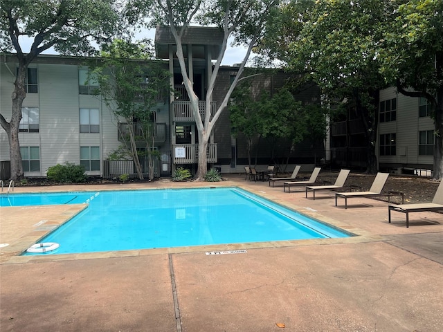 4859 Cedar Springs Rd Unit 150, Dallas, TX 75219 - community pool with a patio