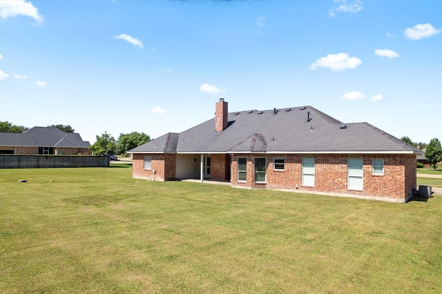 208 Burtonwood Cir, Ovilla, TX 75154 - back of house featuring a chimney and brick siding