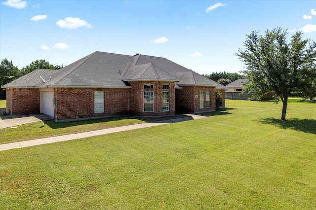 208 Burtonwood Cir, Ovilla, TX 75154 - view of front of home with an attached garage, a front lawn, brick siding, and concrete driveway