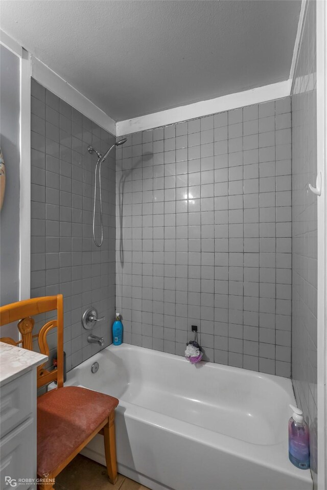 371 Lakeview Dr, Doyline, LA 71023 - bathroom featuring shower / bath combination, vanity, and a textured ceiling