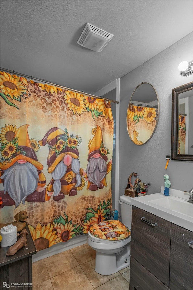 371 Lakeview Dr, Doyline, LA 71023 - bathroom with vanity, toilet, tile patterned floors, a textured ceiling, and a shower with shower curtain