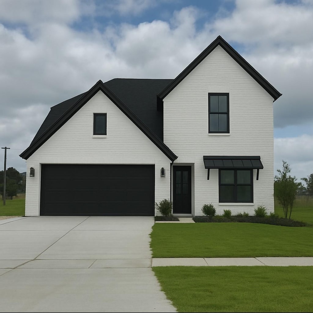 722 Julesburg Ln, Benton, LA 71006 - modern farmhouse featuring concrete driveway and a front yard