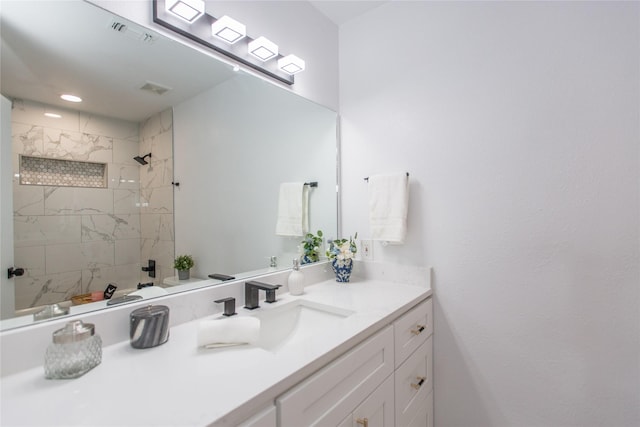 3420 Hampshire Dr, Arlington, TX 76013 - bathroom featuring vanity and a tile shower