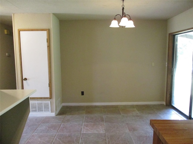 261 Airport Rd, Emory, TX 75440 - unfurnished dining area featuring plenty of natural light, a chandelier, and baseboards