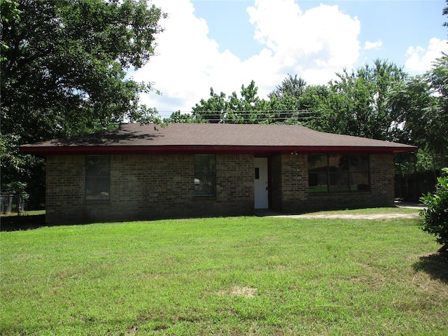 261 Airport Rd, Emory, TX 75440 - view of front of home featuring brick siding and a front lawn