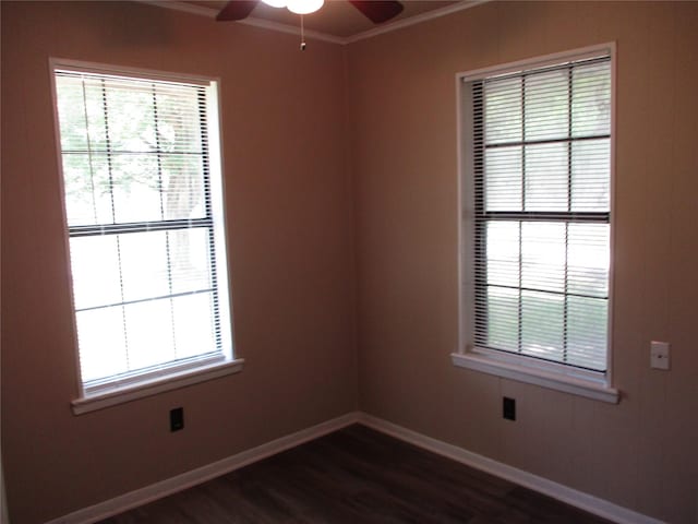 261 Airport Rd, Emory, TX 75440 - spare room featuring a ceiling fan, dark wood finished floors, baseboards, and ornamental molding