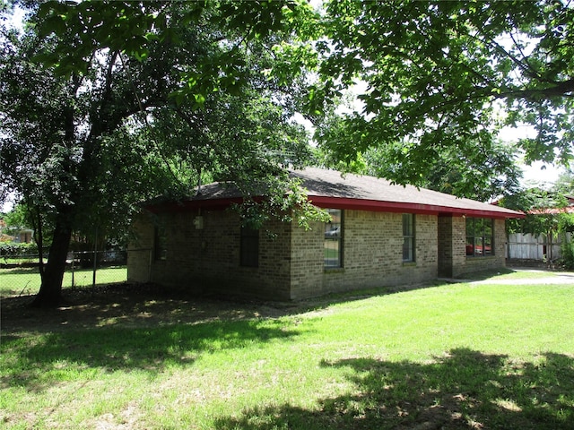 261 Airport Rd, Emory, TX 75440 - view of home's exterior with brick siding