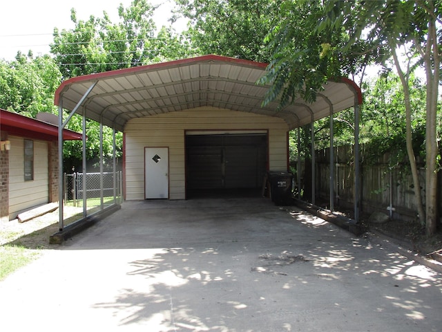 261 Airport Rd, Emory, TX 75440 - view of vehicle parking with a garage